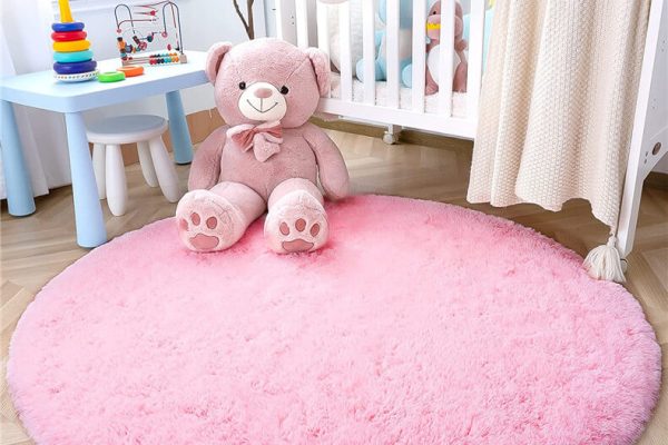 Tapis rond rose clair pour chambre de petite fille